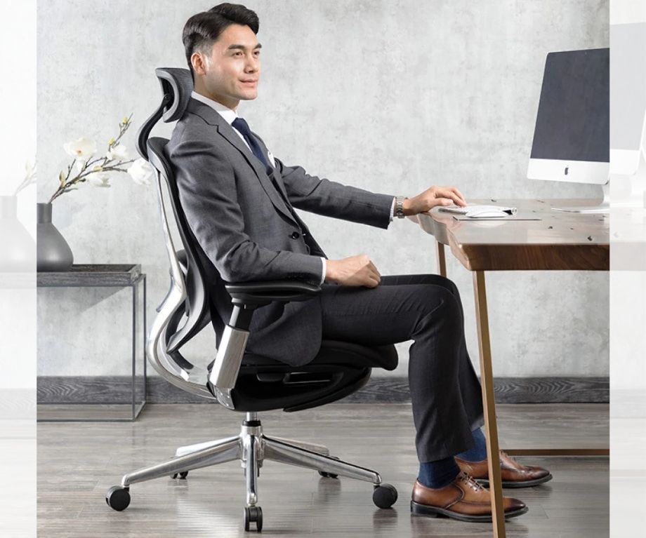 Ghế xoay văn phòng ergonomic – Bảo vệ sức khỏe dân văn phòng ngay từ tư thế ngồi
